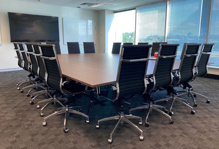 Boardroom seating table size. How many seats will fit?