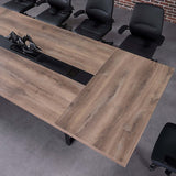 Vantage 2400 Boardroom Table top view showing Warm Oak surface and central cable panel