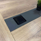 Vantage boardroom table cable cover detail set into the Warm Oak tabletop