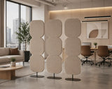 Freestanding acoustic panel divider creating quiet zones in open plan office